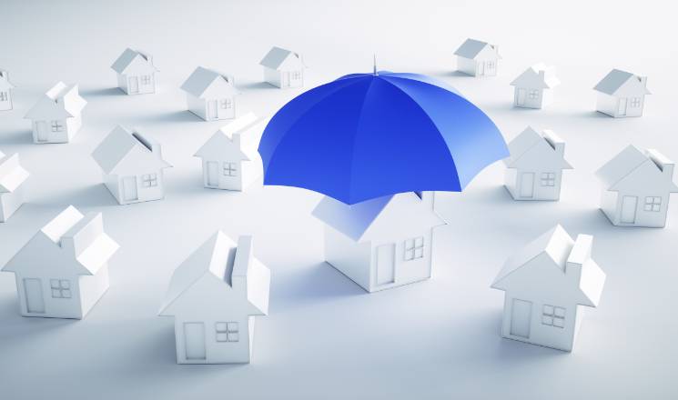 parapluie qui protège une maison